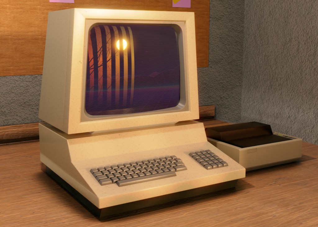 A vintage personal computer with a monitor and keyboard, featuring a retro design, sitting on a wooden desk.
